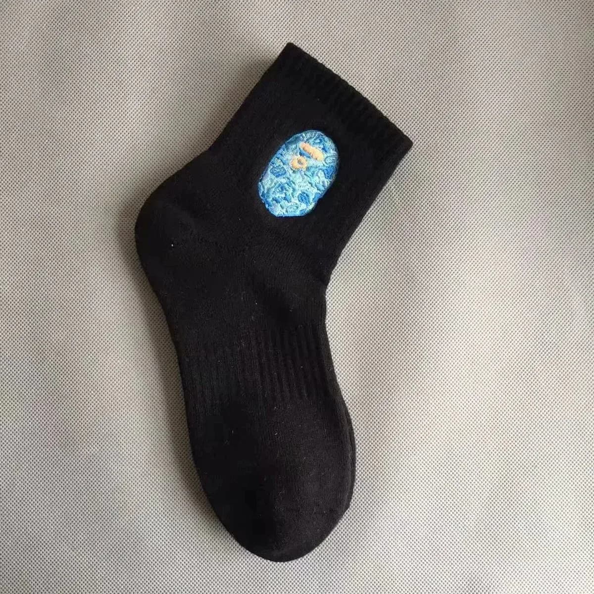 A Bathing Ape Black Socks with Blue Ape Head Logo — Hipobuy Spreadsheet find